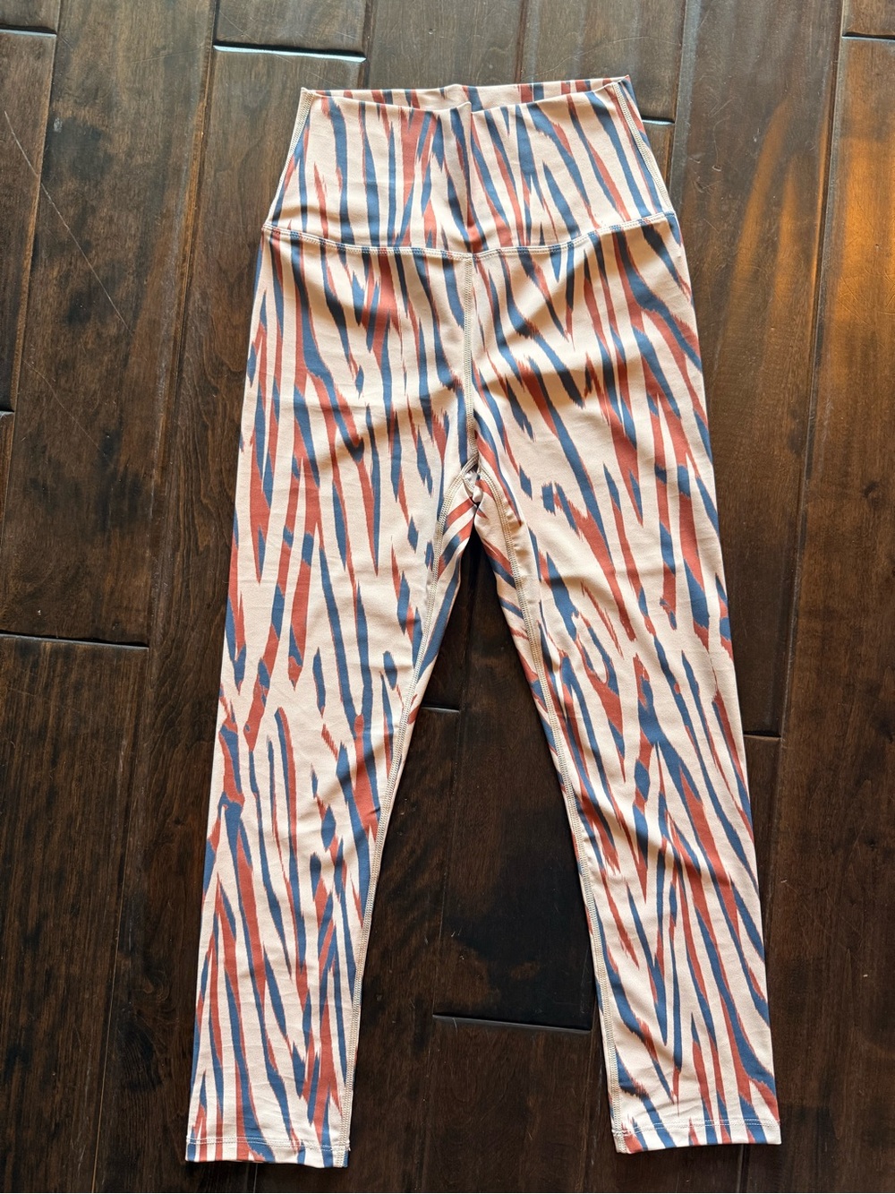Carbon 38 high waisted animal stripe pattern with neutral colors. Size small.
